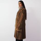 Pastel mink coat with silver collar
