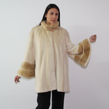 Pearl shaved mink coat with mink trimming