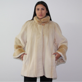 Pearl shaved mink coat with mink trimming