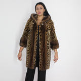 Ocelot coat with hood and mink trimming