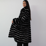 Black with stripes of white shaved mink coat