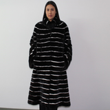 Black with stripes of white shaved mink coat