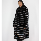 Black with stripes of white shaved mink coat