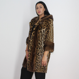 Ocelot coat with hood and mink trimming