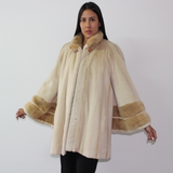 Pearl shaved mink coat with mink trimming