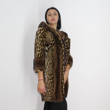 Ocelot coat with hood and mink trimming