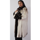 Brown-ivory mink coat with demi-buff trimming