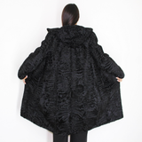 Astrakhan black coat with astronaut hood
