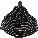 Black with stripes of white shaved mink coat