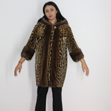 Ocelot coat with hood and mink trimming