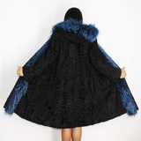 Astrakhan black coat with blue electric colored fox