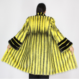 Black-cross yellow colored mink coat with black mink trimming