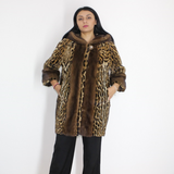 Ocelot coat with hood and mink trimming
