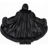 Broadtail Astrakhan black cape-jacket with black fox trimming