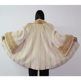 Pearl shaved mink coat with mink trimming