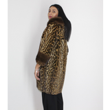 Ocelot coat with hood and mink trimming