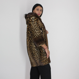 Ocelot coat with hood and mink trimming