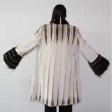 Brown-ivory mink coat with demi-buff trimming