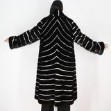 Black with stripes of white shaved mink coat