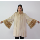 Pearl shaved mink coat with mink trimming